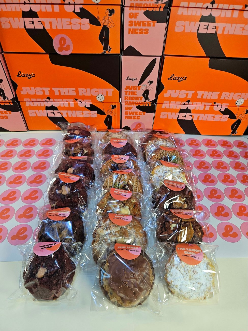 Lizzy's orange gift boxes ready for a corporate order