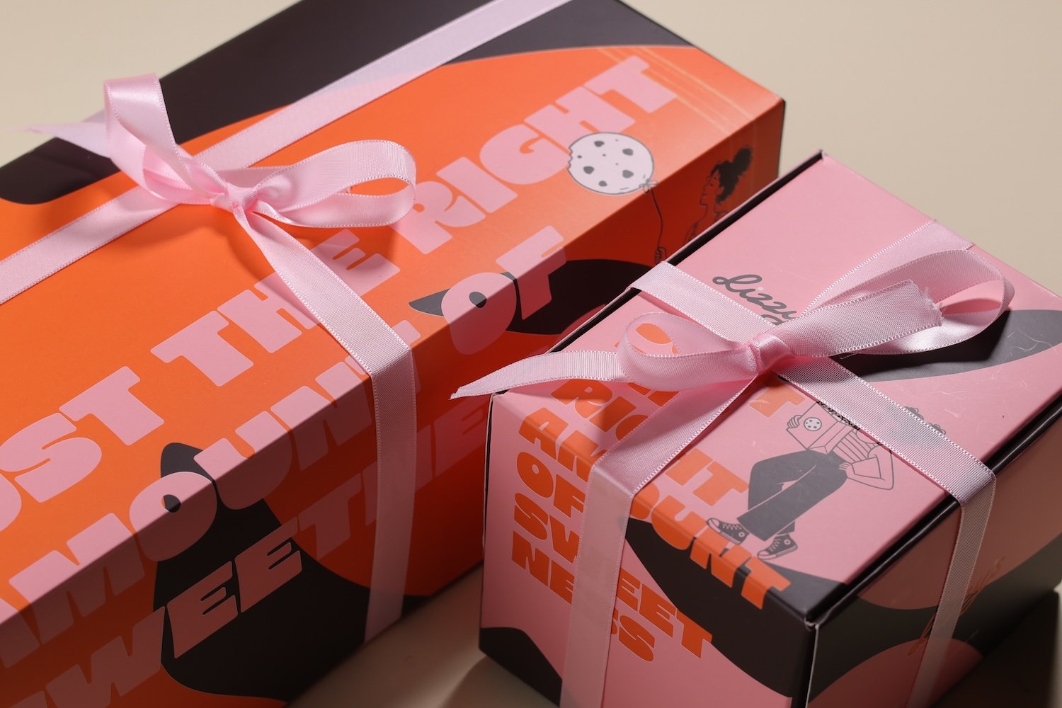 Lizzy’s gift box tied with pink ribbon